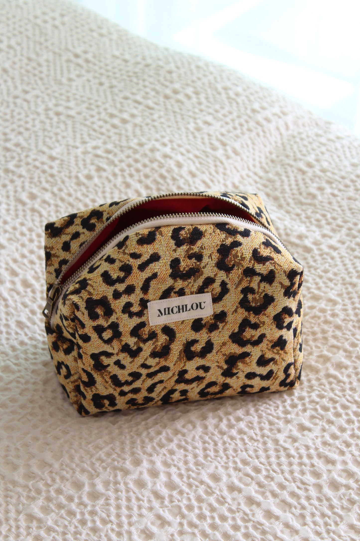Trousse léopard intérieur rouge