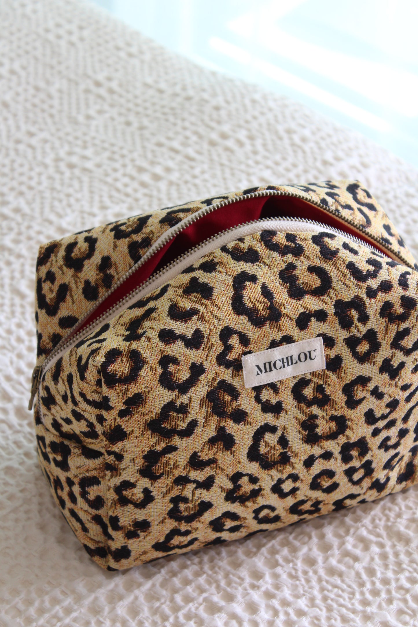 Trousse léopard intérieur rouge